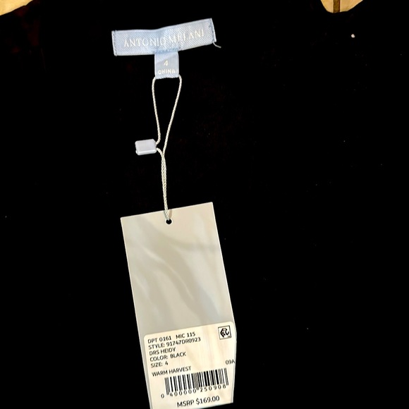 Black dress. Above knees. Beautiful for a cocktail party. - Picture 1 of 2